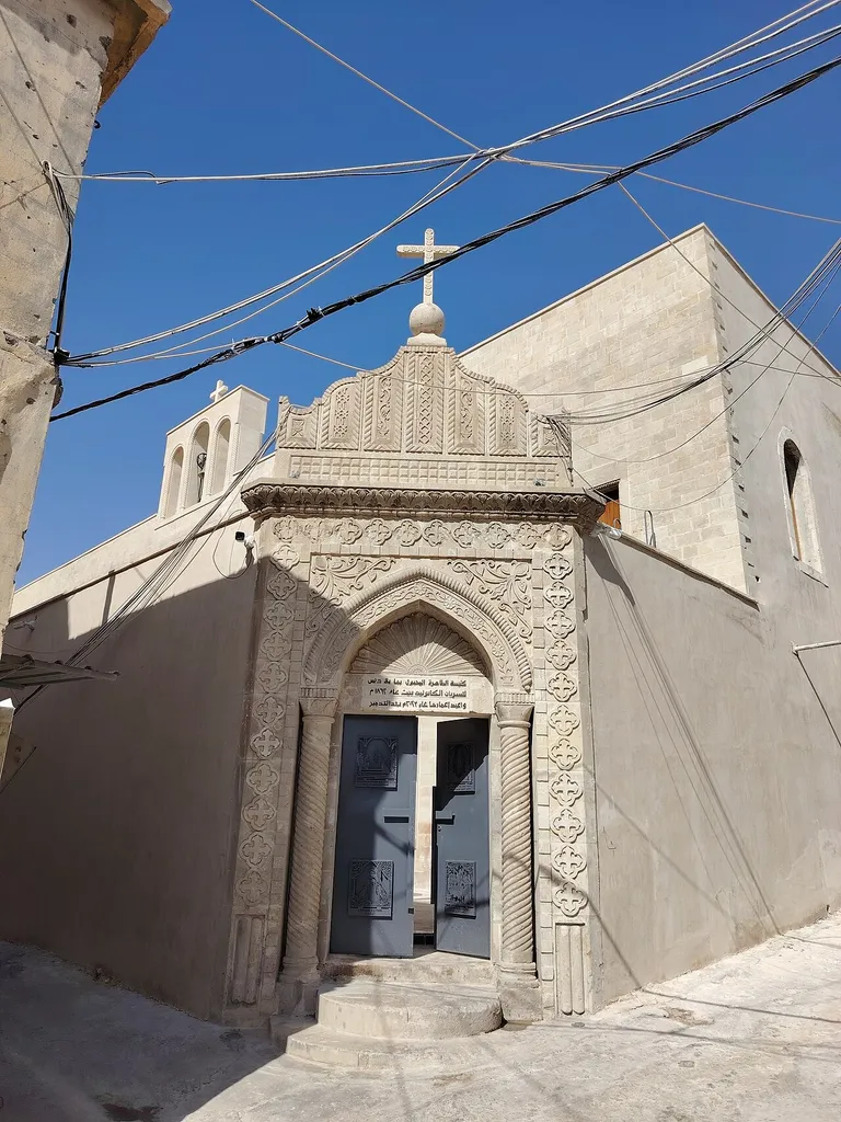 باب الدخول لكنيسة الطاهرة في الموصل