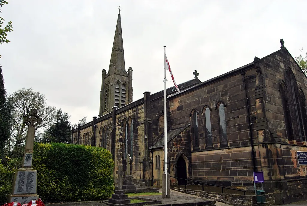 St James' parish church, Church Street, Riddings, Derbyshire, seen from the south.It is aligned north – south, with the chancel at the south and the tower and spire at the north.