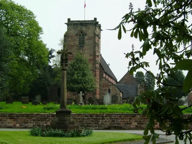 War memorial and St Mary's parish church, Swynnerton, Staffordshire, seen from the west