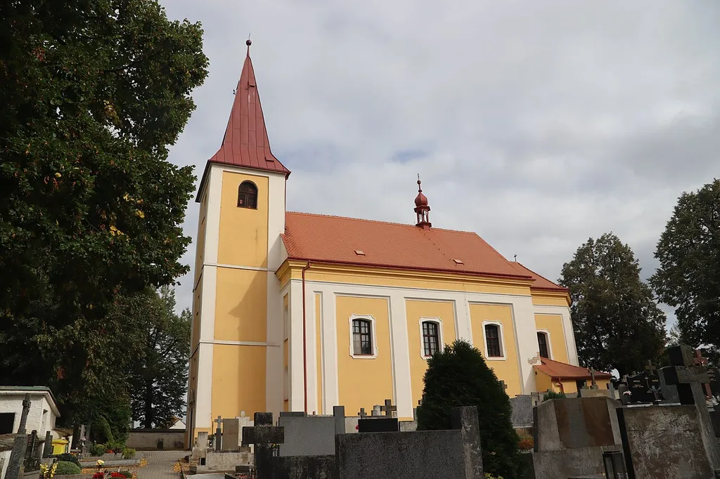 Overview of Church of Saint Bartholomew from cemetery in Koněšín, Třebíč District.