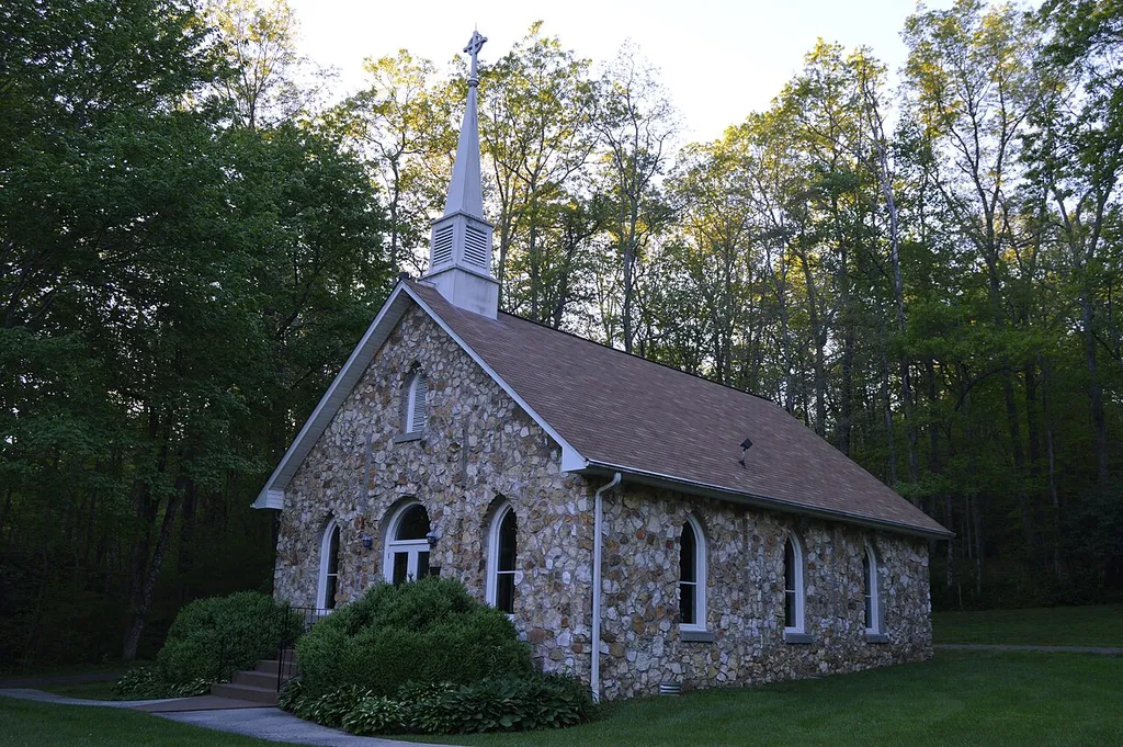 Front and eastern side of Mayberry Presbyterian Church, located along the Blue Ridge Parkway southwest of Meadows of Dan in Patrick County, Virginia, United States. Built in 1925, it is listed on the National Register of Historic Places.