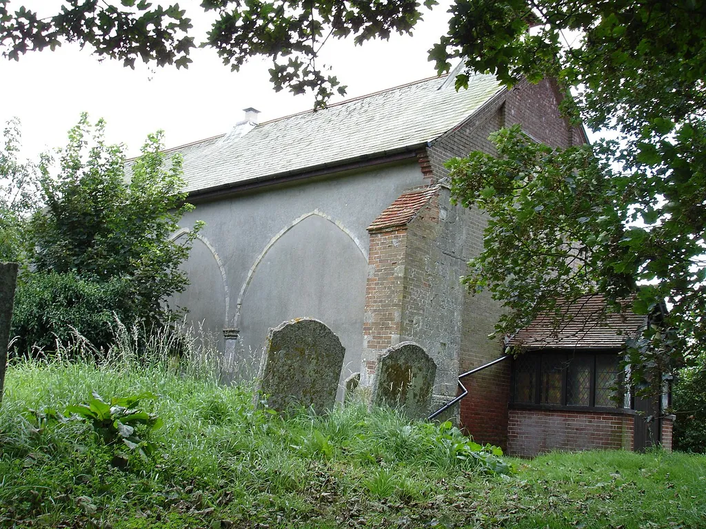 Photograph of the remains of Wix Priory, Wix, Essex, England, now forming the north wall of the church of St Mary the Virgin