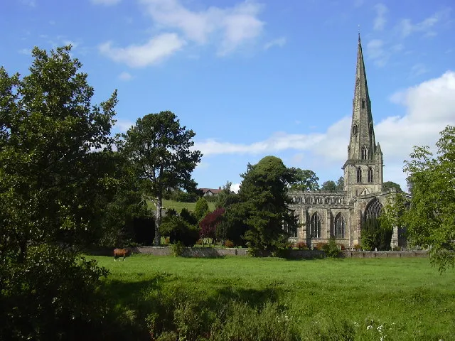 St Oswald's Church, Ashbourne. Built in the 13th and early 14th century this church is one of the grandest in Derbyshire and the finest local example of the Early English style. The most notable feature is the very tall spire 212 feet(65metres)high.