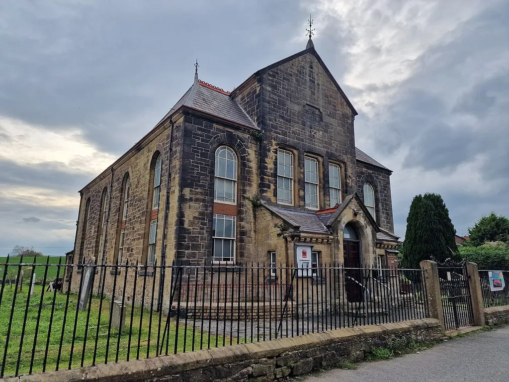 Front of the church, taken on a cloudy afternoon from across the road