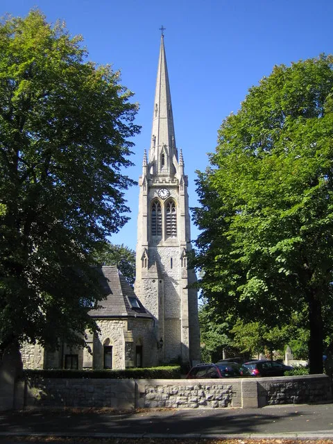 Northwest tower and spire of St Stephen's Court, St Stephen's Avenue, West Ealing, London W13. St Stephen's was built as a parish church in 1876 and the spire was added in 1891. Late in the 20th century the congregation moved out to a new building on the opposite side of the road, and the old building was converted into residential apartments.