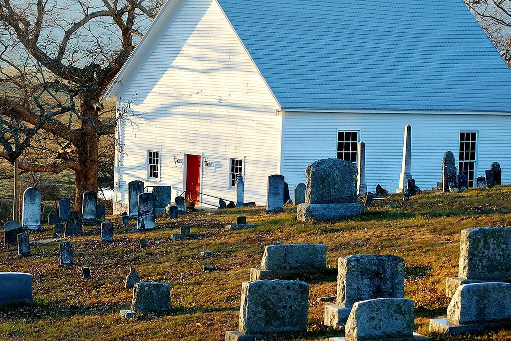 Fall sunset cast shadows acoss the Burke's Garden Central church and cemetery
