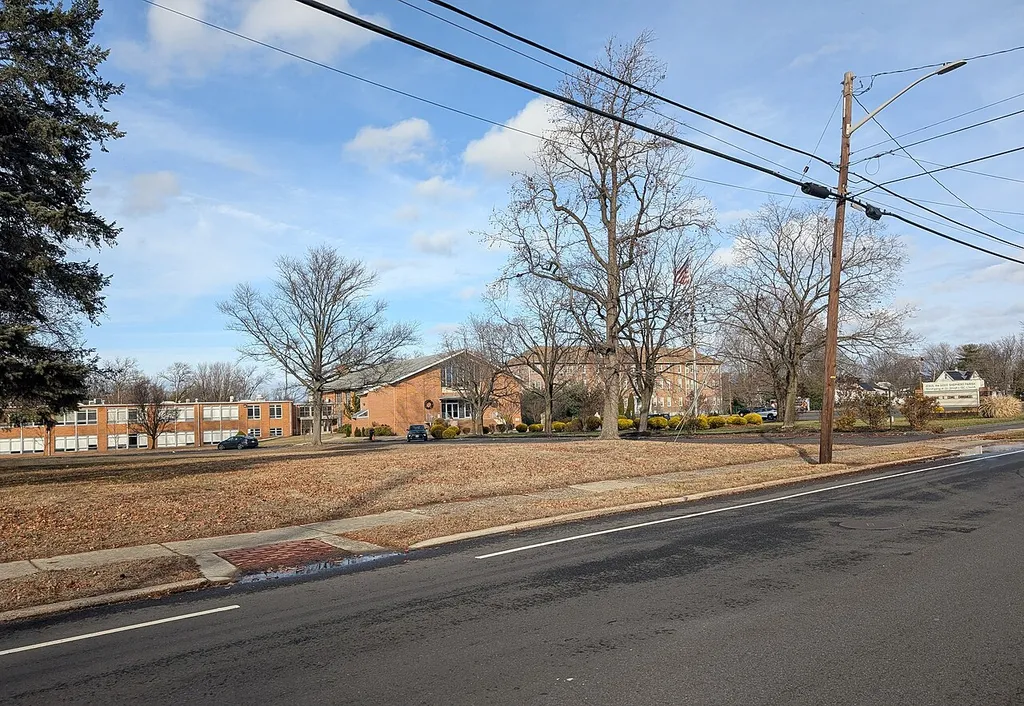 Photo of St. Josephs Church in Beverly, New Jersey. Photo taken from County Route 543 (Warren Street) looking north.