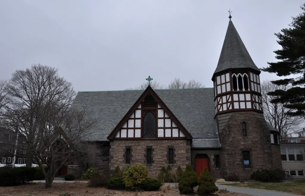 A photograph of the historic Trinity Episcopal Church in Melrose, Massachusetts.