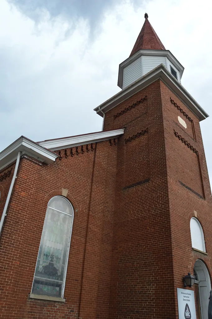 Tower and front of the former Mount Zion Baptist Church (now the Music Resource Center), located at 105 Ridge Street in Charlottesville, Virginia, United States. Built in 1884, it is listed on the National Register of Historic Places.