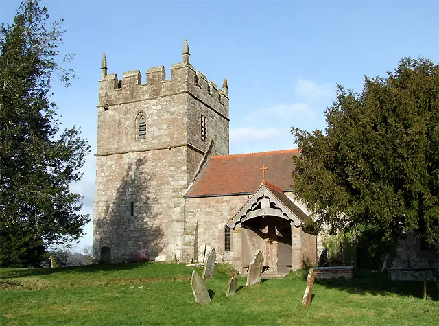 Holy Trinity Church at Holdgate, Shropshire There is a sheela on the south facing wall. See http://www.sheelanagig.org/ and type in Holdgate for pictures of this and other artifacts.