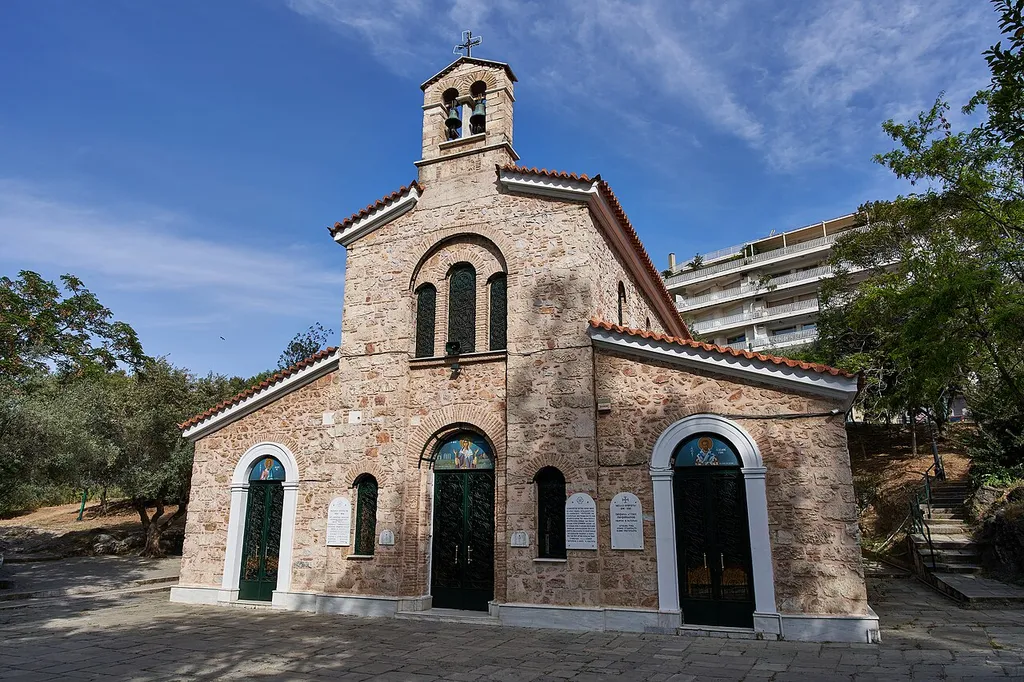 The church is located next to the old stream of the Ilissos.