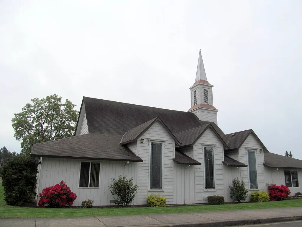 The current Dayton Christian Church building in Dayton, Oregon, United States, sits on the site of and incorporates a number of architectural and structural elements (note the windows and steeple) of the historic Evangelical United Brethren Church. The historic church was built in 1883-1887, and is listed on the US National Register of Historic Places. This is an image of a place or building that is listed on the National Register of Historic Places in the United States of America. Its reference number is 87000346 (Wikidata).