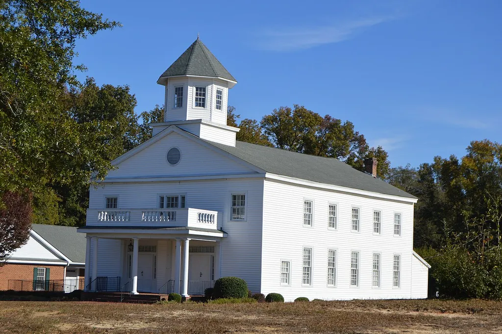 Front and southwestern side of the Laurel Hill Presbyterian Church, located at the intersection of McFarland and Laurel Hill Church Roads, east of Laurel Hill, in Scotland County, North Carolina, United States. Built in 1856, it is listed on the National Register of Historic Places.