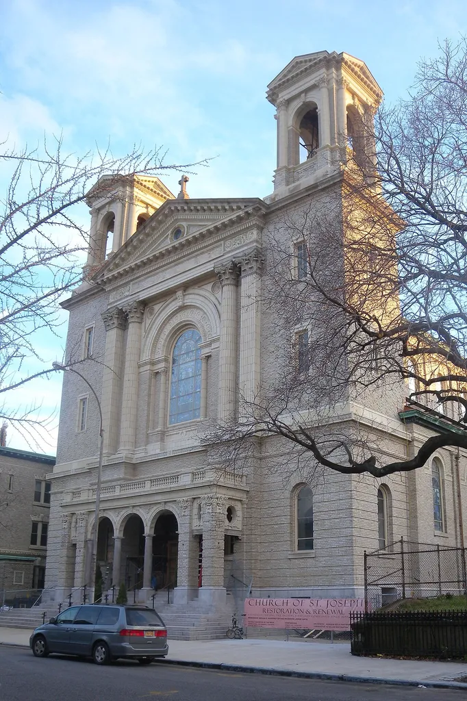Looking southeast across Pacific Street at St Josephs Church on a mostly cloudy afternoon. Was named co-cathedral in February 2013.CBS News, 3 March 2013
