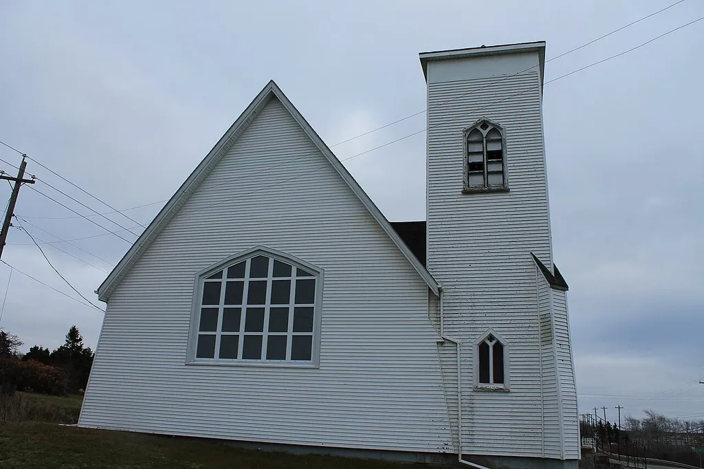 the second building, constructed in 1895 and designed by William Harris.