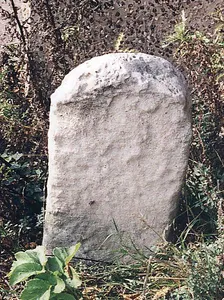 Milestone, by E corner of "Glenhaven", opp. Church Rooms