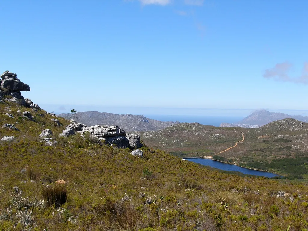 View of Silvermine Nature Reserve, with the Silvermine reservoir on the righthand side and the Atlantic behind the hills.