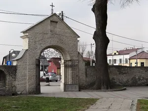 Fence with a gate of the Adalbert of Prague church in Książ Wielki