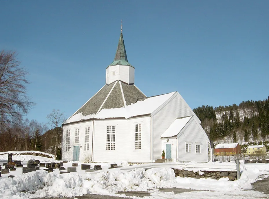 Kleive and the Kleive kirke This is a photo of a monument in Norway, number: 84790 in the Norwegian Directorate for Cultural Heritage database.