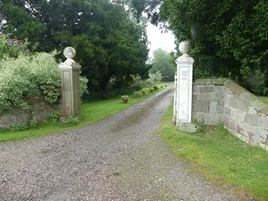 Gate, gate piers and flanking walls approximately 78 metres to south west of Church of Saint Bartholomew