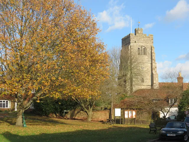 A green beside The Street, Egerton, Kent, looking northeast to the tower of St James' parish church