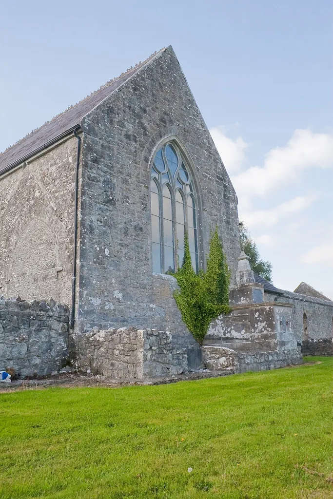 East window of Meelick Friary in a medieval style but which was probably inserted in the late 19th century. There is a 19th-century mausoleum attached to it with carvings, see NIAH record.