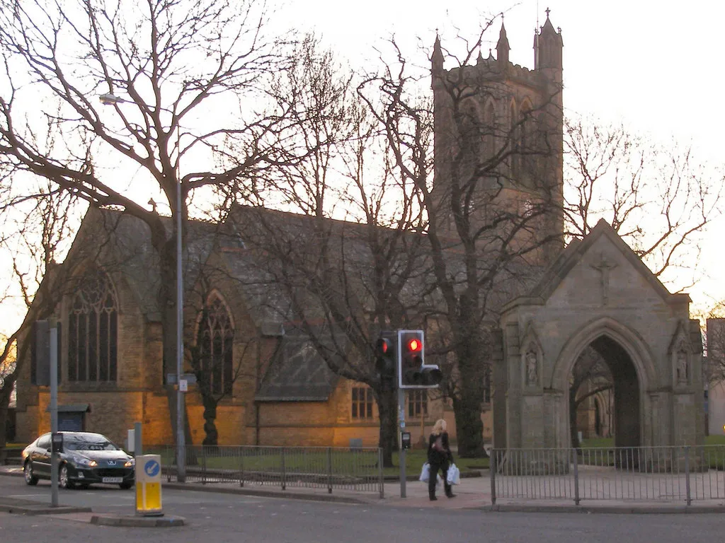 St Peter's Church and lych gate, Swinton, near to Swinton, Salford, Great Britain. Viewed across the Chorley Road/Partington Lane junction. <a title="https://www.genuki.org.uk/big/eng/LAN/Swinton/StPeter.shtml" rel="nofollow" href="https://www.genuki.org.uk/big/eng/LAN/Swinton/StPeter.shtml">Link</a><img style="padding-left:2px;" alt="External link" title="External link - shift click to open in new window" src="http://s0.geograph.org.uk/img/external.png" width="10" height="10"/>