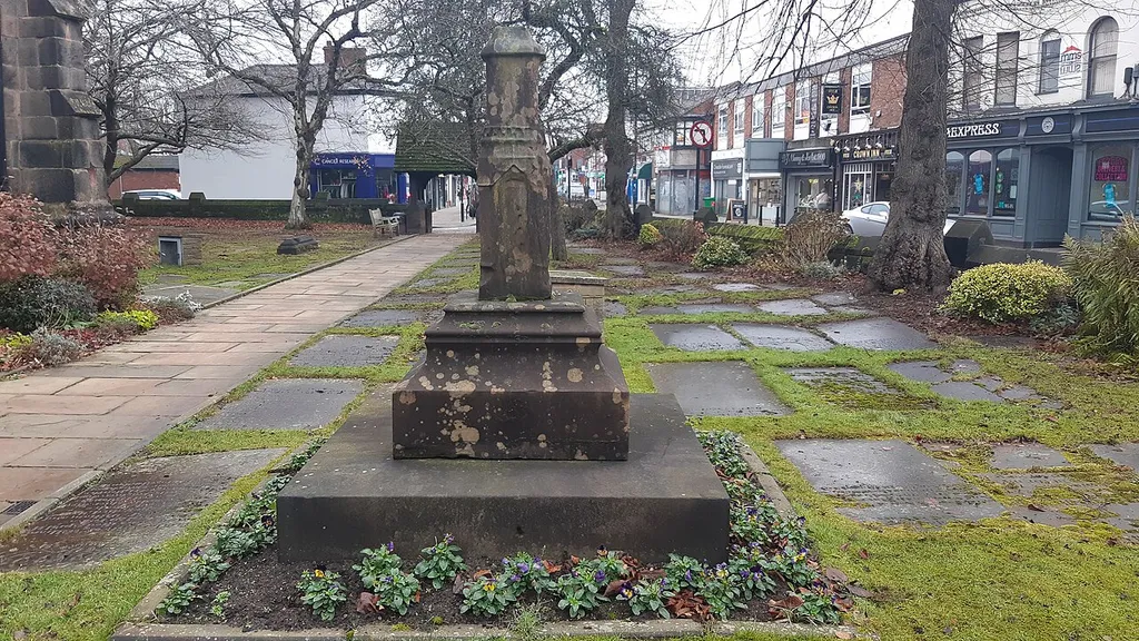 Cross to south of Church of St Mary (cross in Cheadle, Greater Manchester, UK).