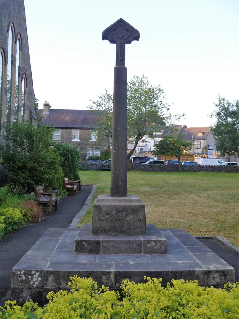 Photograph of the war memorial in the churchyard of St Mary's Church, Buxton, Derbyshire, England