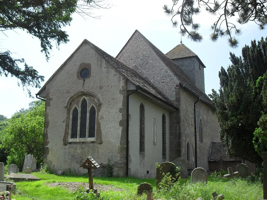 Exterior view (from the northeast) of the Grade I-listed St John the Baptist's Church, Clayton, West Sussex, England.