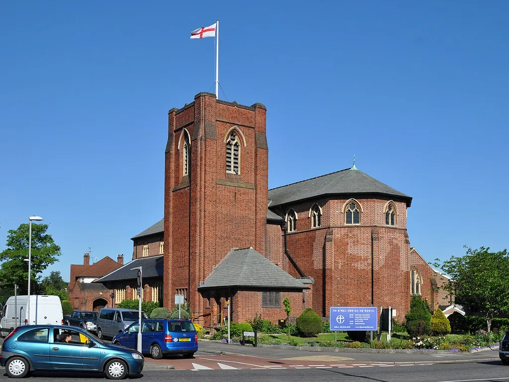Parish church of St James, Malden Road, New Malden, London (formerly Surrey), seen from the southeast. Note the Korean-language sign, reflecting the area's high Korean population.