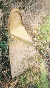 Milepost, Edgcott Road; nr Hall Cottages, N of parish church