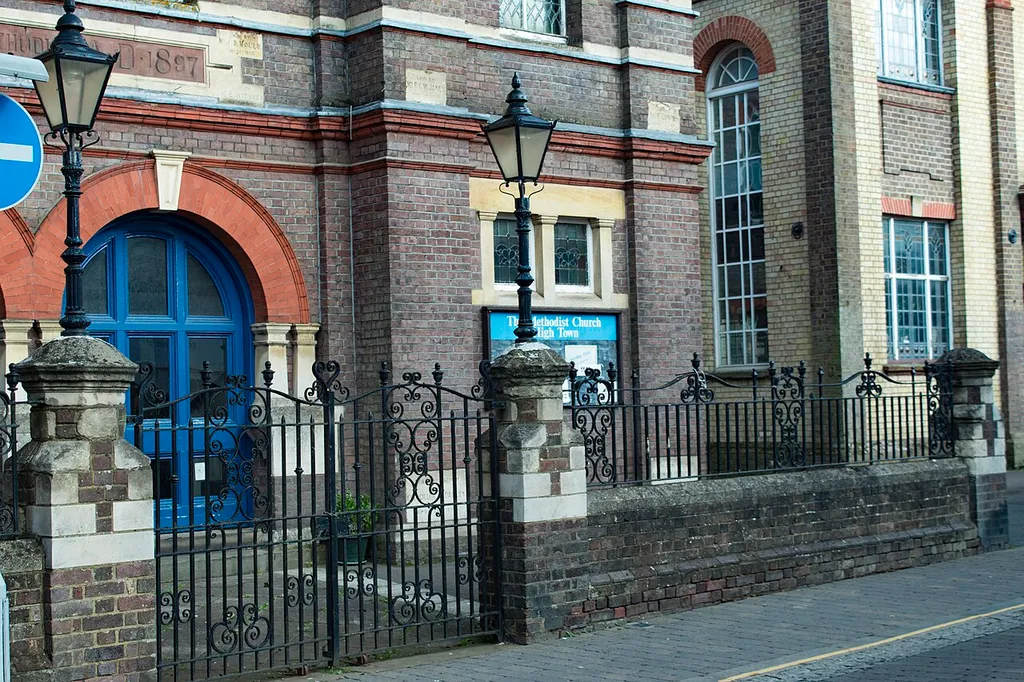 Gates, Dwarf Wall And Railings To High Town Methodist Church .mw-parser-output .messagebox{margin:4px 0;width:auto;border-collapse:collapse;border:2px solid var(--border-color-progressive,#6485d1);background-color:var(--background-color-neutral-subtle,#fbfcff);color:var(--color-base,#202122);box-sizing:border-box;border-inline-start-width:8px}.mw-parser-output .messagebox.mbox-small{font-size:88%;line-height:1.25em}.mw-parser-output .mbox-warning,.mw-parser-output .mbox-speedy{border:2px solid var(--border-color-error,#b22222);background:var(--background-color-error-subtle,#ffdbdb);border-inline-start-width:8px}.mw-parser-output .mbox-serious,.mw-parser-output .mbox-delete,.mw-parser-output .mbox-stop{border:2px solid var(--border-color-error,#b22222);border-inline-start-width:8px}.mw-parser-output .mbox-issue,.mw-parser-output .mbox-content{border:2px solid #f28500;background:var(--background-color-warning-subtle,#ffe);border-inline-start-width:8px}.mw-parser-output .mbox-query,.mw-parser-output .mbox-style{border:2px solid #f4c430;background:var(--background-color-warning-subtle,#ffe);border-inline-start-width:8px}.mw-parser-output .mbox-shit{border:2px solid #960;border-inline-start-width:8px}.mw-parser-output .mbox-license{border:2px solid #88a;border-inline-start-width:initial}.mw-parser-output .mbox-legal{border:2px solid var(--border-color-notice,#666);background:var(--background-color-base,#fff);border-inline-start-width:8px}.mw-parser-output .mbox-honor{border:2px solid #ca3;background:var(--background-color-warning-subtle,#fcf4db);border-inline-start-width:8px}.mw-parser-output .mbox-growth{border:2px solid #8d4;background:var(--background-color-success-subtle,#d5fdf4);border-inline-start-width:8px}.mw-parser-output .mbox-move{border:2px solid #93c;border-inline-start-width:8px}.mw-parser-output .mbox-protection,.mw-parser-output .mbox-message{border:2px solid var(--border-color-base,#aaa);border-inline-start-width:8px}.mw-parser-output .messagebox .mbox-t