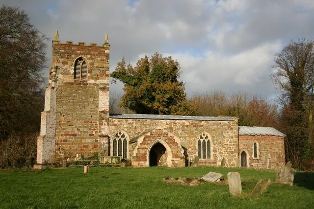 St.Michael's church, Market Stainton. Perpendicular tower, Decorated nave and chancel rebuilt in 1848, an attractive, rustic medley of greenstone and brick in St.Michael's church