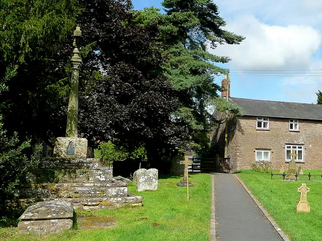 Stone cross in St David's parish churchyard, Much Dewchurch, Herefordshire, seen from the southeast