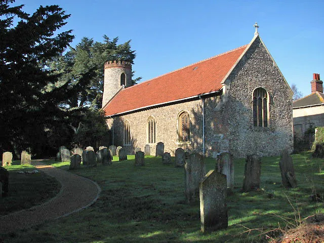 The church of SS Gervase and Protase. The church in Little Plumstead is the only church in England dedicated to SS Gervasius and Protasius - it is presumed that the day of laying out the church plan, or the day of its consecration fell on the saints' feast day. The round-towered church > 911547 - 911582 - adjoining the former Hall > 685950 which in 1929 was converted into a hospital and is presently awaiting demolition - dates from the 12th century (the core of its walls is Norman) and was extensively restored in the 19th century; furnishings, window glass and font date from this time. The old 17th century font > 911543 which was replaced by a 19th century font > 911587 now stands beside the south porch and serves as a bird bath. The east window (dated to c 1850) is a memorial to Admiral Stephens, who served in the Navy during the Napoleonic wars and became Admiral in 1837. The east window > 911550 - 911553 displaced glass panels which had been inserted by the Revd Charles Penrice. They can now be seen in the south chancel window > 911557. Some of these panels are by Robert Allen (1834) of Lowestoft, who worked at the Lowestoft porcelain factory and made glass painting his hobby > 911560 - 911562. The small roundels > 911565 and the square panels depicting arms are believed to have been made by Samuel Yarrington of Norwich, who created enamelled glass (not true stained glass). There are several 18th and 19th century memorial tablets > 911569. A large monument to the Yarmouth apothecary and art collector Thomas Penrice and his wife Hannah and their family, who lived in the neighbouring Hall, is located on the north wall > 911574. (This information was taken from "A History of SS Gervase and Protase - Little Plumstead", compiled by Richard L Hale and published by the Church in the Plumsteads.) The church is kept locked. See also: http://www.norfolkchurches.co.uk/littleplumstead/index.html