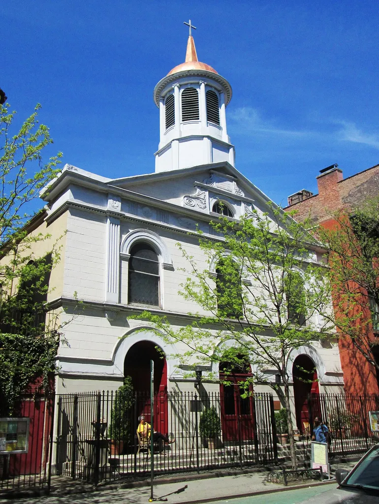 St. John's Evangelical Lutheran Church at 81 Christopher Street between Bleecker Street and Seventh Avenue South in the West Village neighborhood of Manhattan, New York City was built in 1821-22 in a modified Federal style as the Eighth Presbyterian Church, making it the sixth oldest extant place of worship in Manhattan. In the late 1790s, the site had been the location of Hartwick Seminary, the fist Lutheran seminary in the United States. In 1842 the Presbyterian congregation left, turning the church over to St. Matthew's Protestant Episcopal Church, which used it until 1858, when the German Lutheran congregation took over. Some of the church's Victorian ornamentation was added in 1886 by Berg &amp; Clark. (Sources: From Abyssinian to Zion and historical plaques on the church)