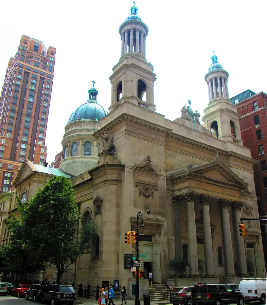 The Roman Catholic Church of St. Jean Baptiste, located at 1067-1071 Lexington Avenue (also known as 184 East 76th Street), in the Lenox Hill neighborhood of the Upper East Side, New York City, was built in 1910-13 and was designed by Nicholas Serracino, inspired by Italian Mannerism. It features a 175-foot dome. A renovation was undertaken by Hardy Holzman Pfeifer from 1996-96 in which the somber interior was decorated in bright colors by Felix Chavez, and new stained class windows by Patrick Clark were installed. (Sources: Guide to NYC Landmarks (4th ed.), From Abyssinian to Zion (2004) and AIA Guide to NYC (5th ed.))