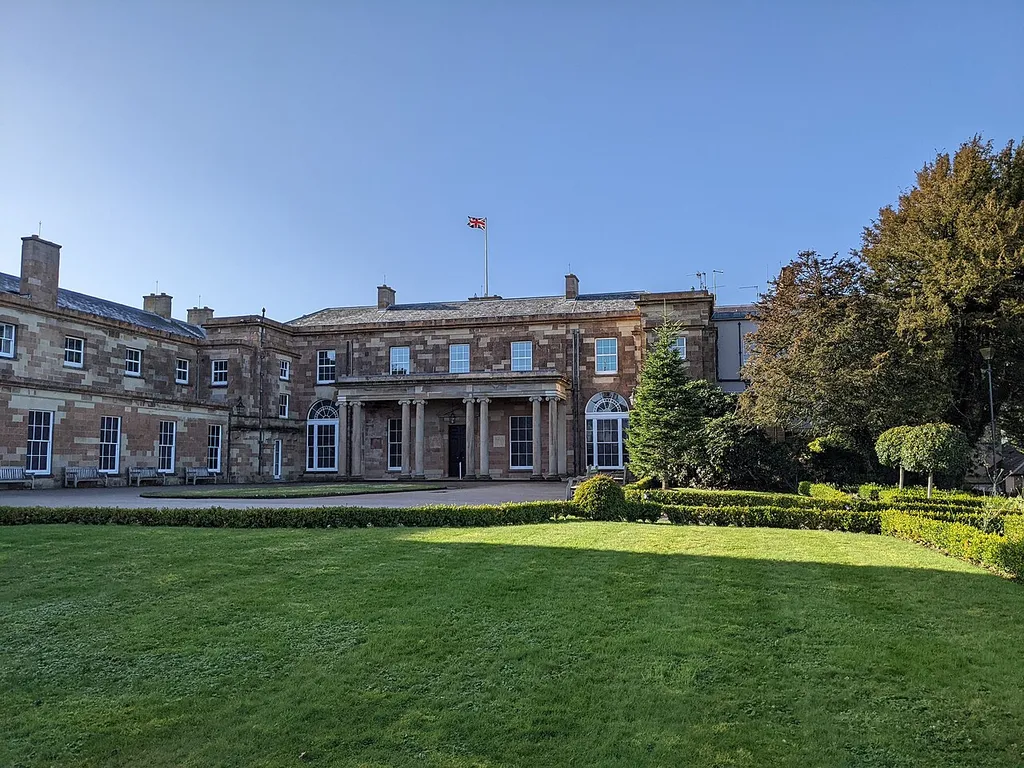 Hillsborough Castle at Royal Hillsborough, Co. Down (UK) with the flag flying, marking the 70th anniversary of the Ascension to the throne by Queen Elizabeth II.