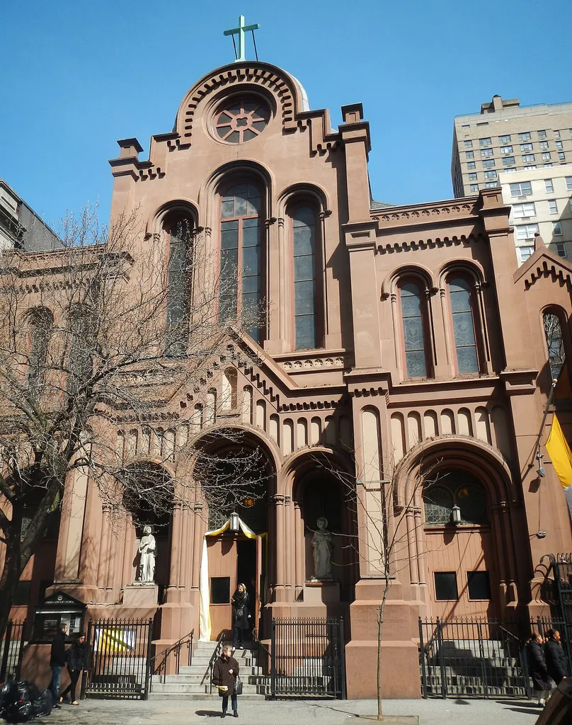 Looking north at Church of St Stephen &amp; the Holy Scapular, today having a sign for Church of the Epiphany, late on a sunny morning.