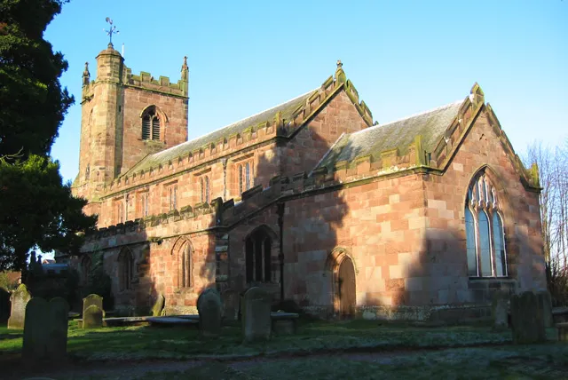 St Margaret's parish church, Wrenbury, Cheshire, England, seen from the southeast. The parish was built early in the 16th century of local red sandstone. The chancel (right) was added in 1806.