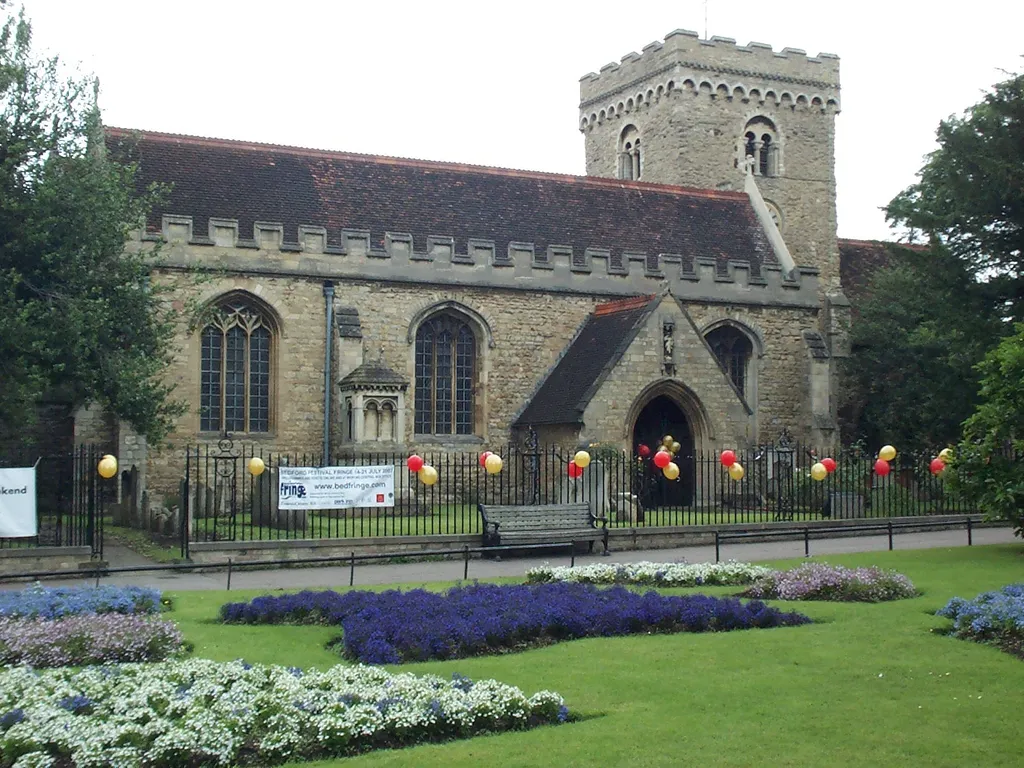 Parish Church of St Peter de Merton with St Cuthbert, Bedford. Near the statue of John Bunyan. The bell tower is Saxon and may be the oldest structure in Bedford.