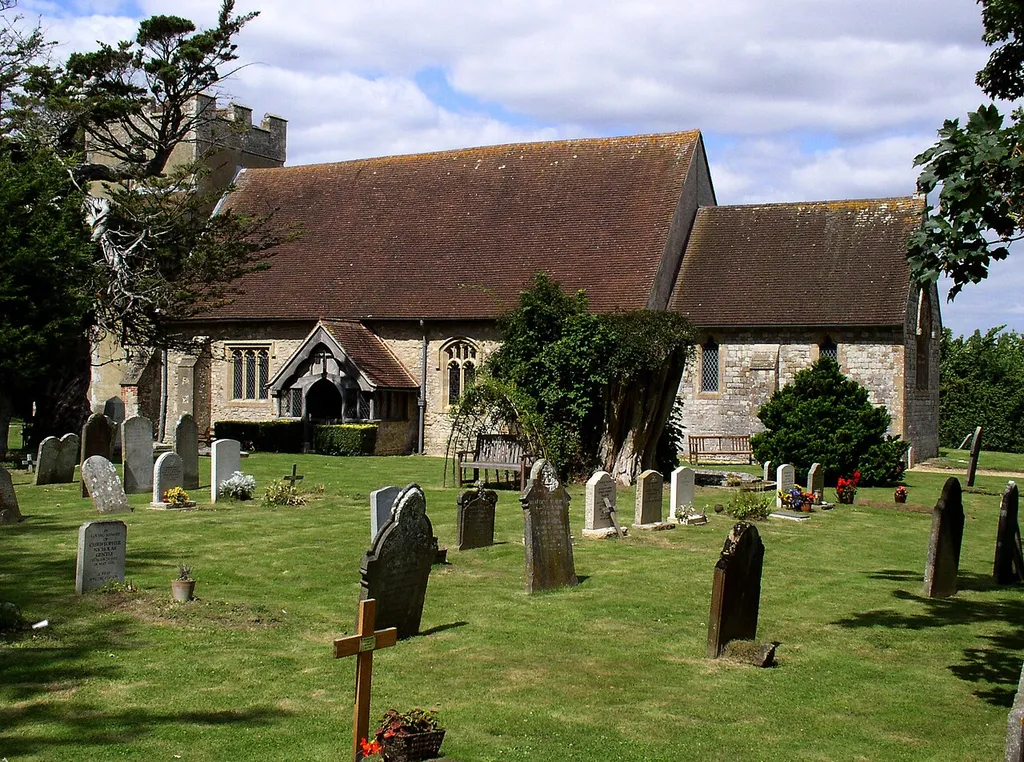 St James' Church, Birdham from the south, showing the churchyard.