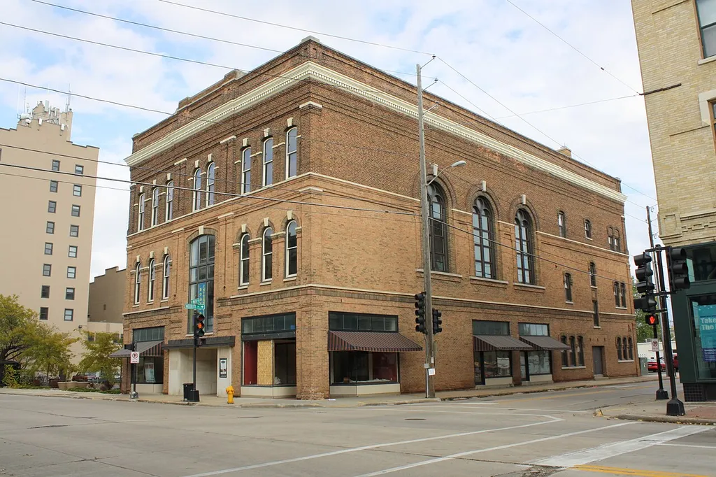 The building at 502 Main St., w:Oshkosh, Wisconsin, was the w:First Methodist Church (Oshkosh, Wisconsin), listed on the National Register of Historic Places.