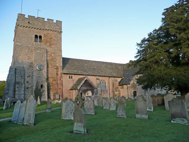 St. Michael's and All Angels church, Lydbury North, near to Lydbury North, Shropshire, Great Britain. A fine red sandstone building glowing in the winter afternoon sunshine.