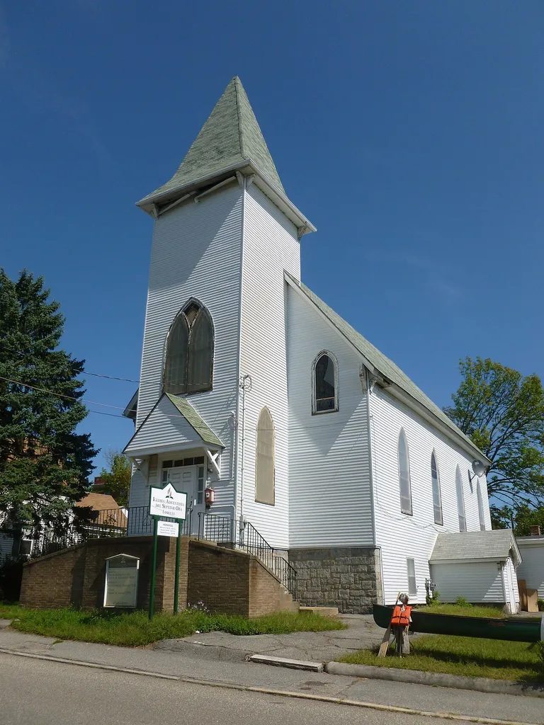 Iglesia Adventista del Septimo Dia, a Hispanic Seventh Day Adventist Church located at 20 Meadowcroft Street, Lowell, Massachusetts. West (front) and south sides of building shown.