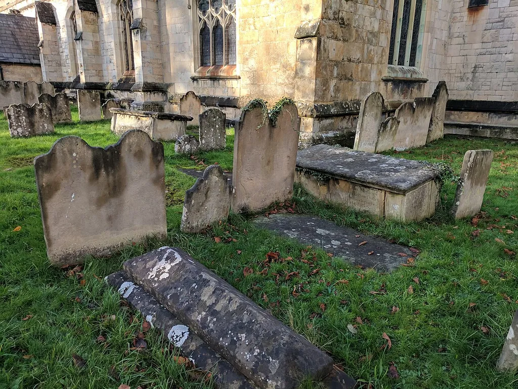Headstone 3 Metres South Of Lady Chapel At Church Of St Edmund .mw-parser-output .messagebox{margin:4px 0;width:auto;border-collapse:collapse;border:2px solid var(--border-color-progressive,#6485d1);background-color:var(--background-color-neutral-subtle,#fbfcff);color:var(--color-base,#202122);box-sizing:border-box;border-inline-start-width:8px}.mw-parser-output .messagebox.mbox-small{font-size:88%;line-height:1.25em}.mw-parser-output .mbox-warning,.mw-parser-output .mbox-speedy{border:2px solid var(--border-color-error,#b22222);background:var(--background-color-error-subtle,#ffdbdb);border-inline-start-width:8px}.mw-parser-output .mbox-serious,.mw-parser-output .mbox-delete,.mw-parser-output .mbox-stop{border:2px solid var(--border-color-error,#b22222);border-inline-start-width:8px}.mw-parser-output .mbox-issue,.mw-parser-output .mbox-content{border:2px solid #f28500;background:var(--background-color-warning-subtle,#ffe);border-inline-start-width:8px}.mw-parser-output .mbox-query,.mw-parser-output .mbox-style{border:2px solid #f4c430;background:var(--background-color-warning-subtle,#ffe);border-inline-start-width:8px}.mw-parser-output .mbox-shit{border:2px solid #960;border-inline-start-width:8px}.mw-parser-output .mbox-license{border:2px solid #88a;border-inline-start-width:initial}.mw-parser-output .mbox-legal{border:2px solid var(--border-color-notice,#666);background:var(--background-color-base,#fff);border-inline-start-width:8px}.mw-parser-output .mbox-honor{border:2px solid #ca3;background:var(--background-color-warning-subtle,#fcf4db);border-inline-start-width:8px}.mw-parser-output .mbox-growth{border:2px solid #8d4;background:var(--background-color-success-subtle,#d5fdf4);border-inline-start-width:8px}.mw-parser-output .mbox-move{border:2px solid #93c;border-inline-start-width:8px}.mw-parser-output .mbox-protection,.mw-parser-output .mbox-message{border:2px solid var(--border-color-base,#aaa);border-inline-start-width:8px}.mw-parser-output .messagebox .mbox