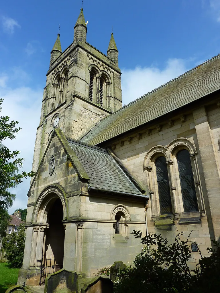 South porch and west tower of All Saints' parish church, Helmsley, North Yorkshire, seen from the southeast