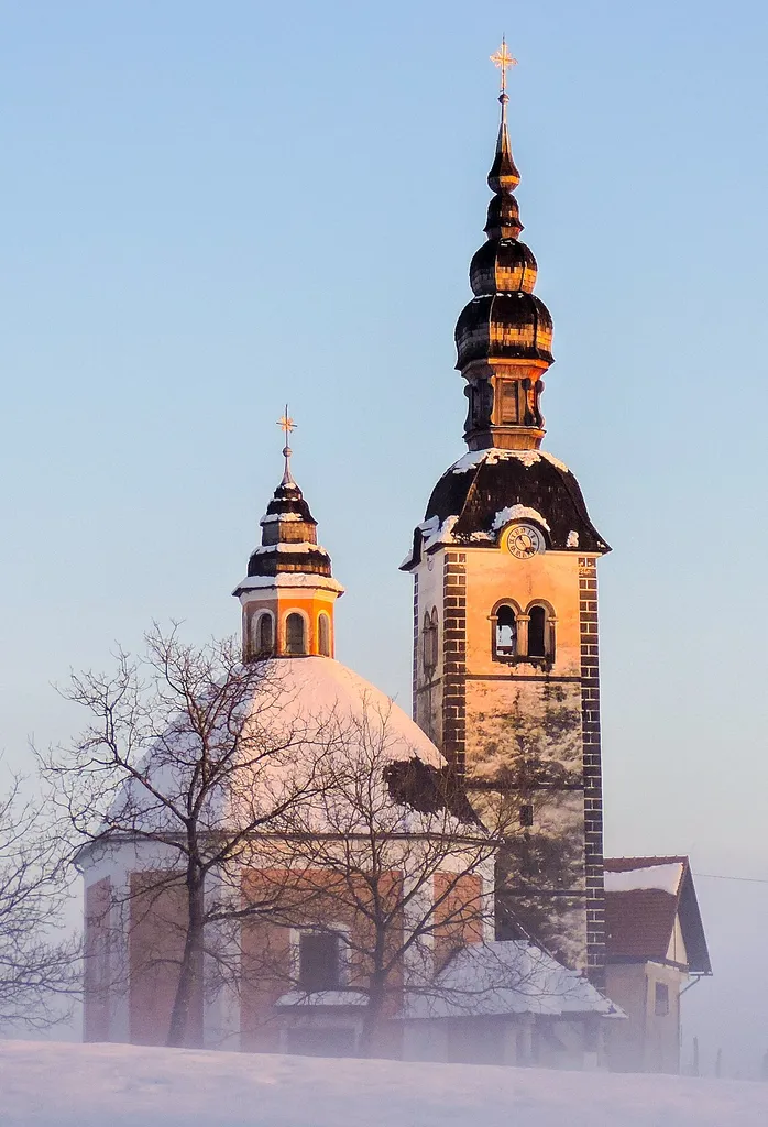 This church located on top of village Vinji vrh in the municipality of Semič in Slovenia and has 2 anointed saints. The Holy Trinity and Saint Martin. It was built in 1647 and has been a pilgrimage site ever since, specially for Saint Martin. The main altar is the work of F.A. Nirenberg from the year 1741. It is one of the largest altars in Bela krajina (White Carniola) and Dolenjska (Lower Carniola) regions. It is gold plated and takes place in the whole presbytery. The church has two side altars that are baroque in nature.