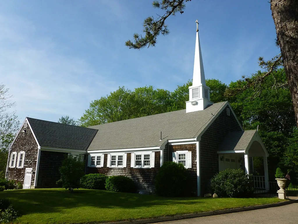 Trinity Lutheran Church, located at 1883 Main Street Brewster, Masschusetts 02631-1826. South (front) and west sides of building shown.